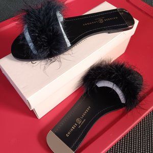 Black flat slide with feathers, never worn